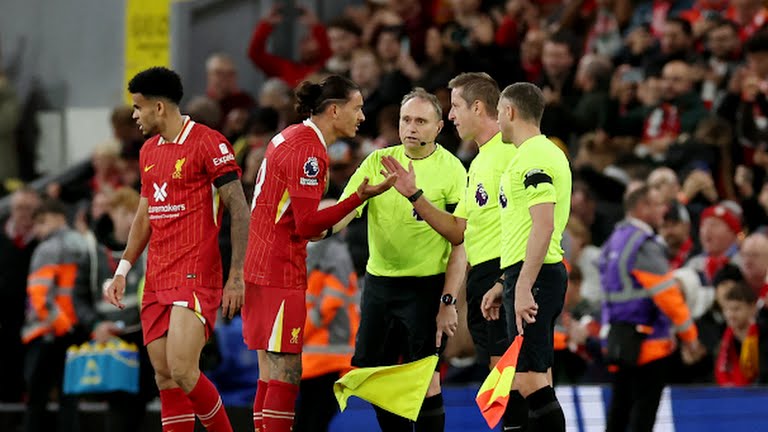 Liverpool's Darwin Nunez speaks with referee John Brooks after the match - Photo Credit : REUTERS