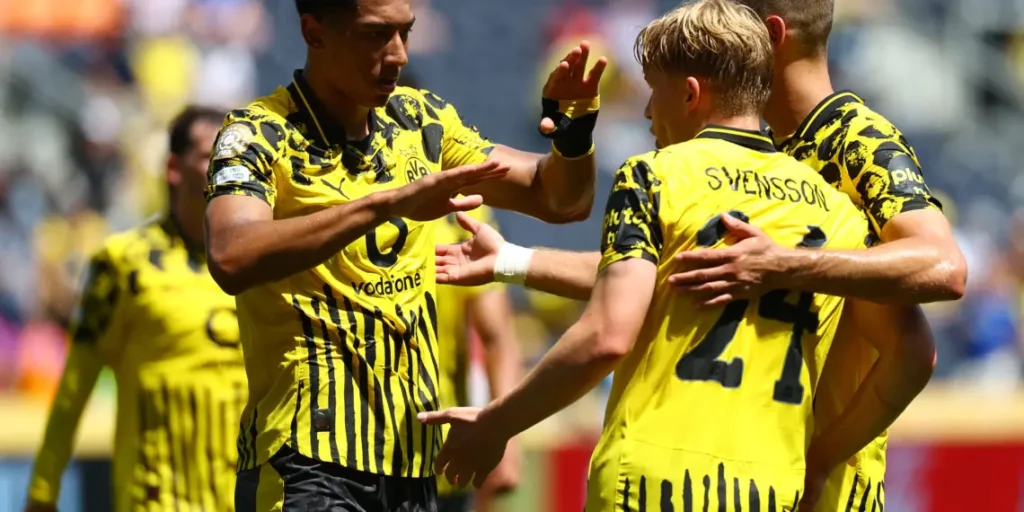 Daniel Svensson celebrates scoring their first goal with Waldemar Anton and Jobe Bellingham (Photo Credit: Reuters)