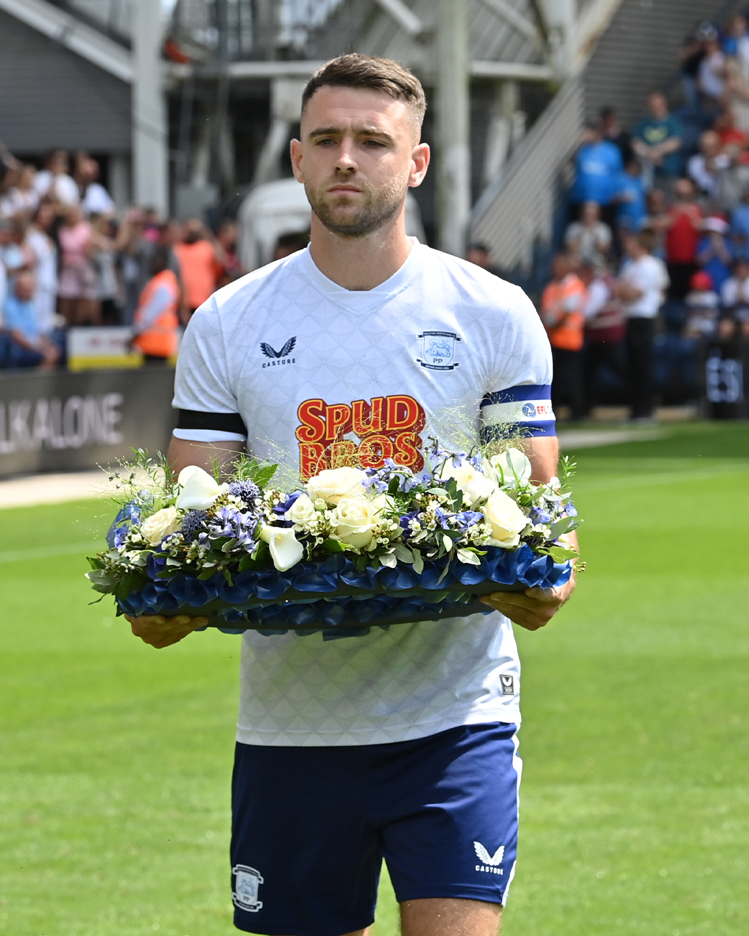 Ben Whiteman lays a wreath for Diogo Jota during the pre-season friendly football match between Preston North End and Liverpool (Photo Credit: Getty)