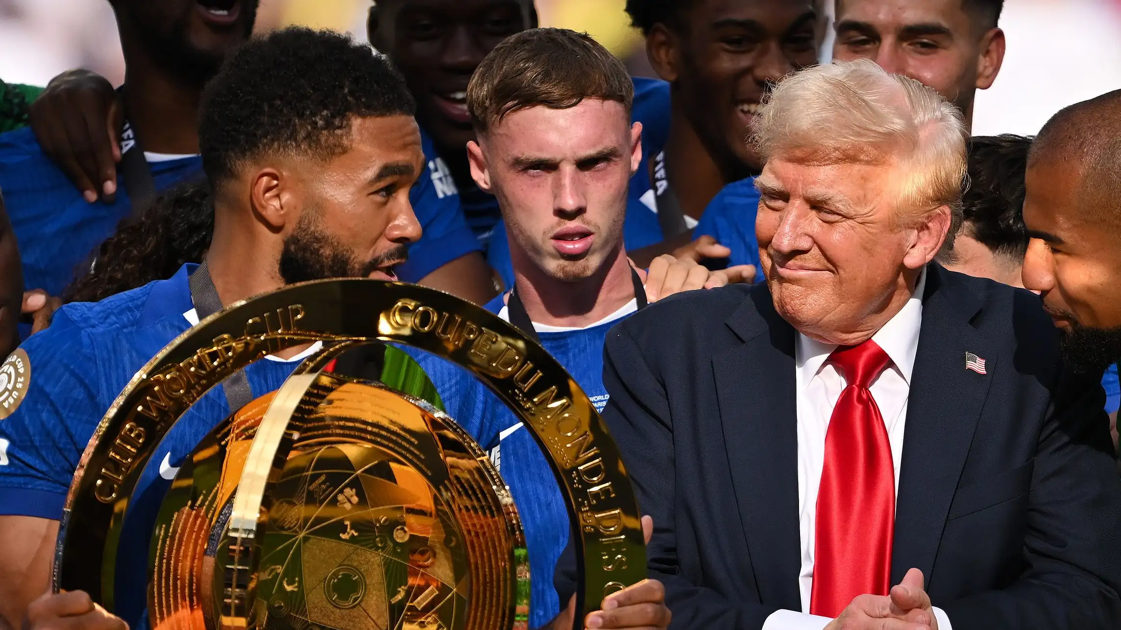 Cole Palmer looked confused as Donald Trump remained on the podium (Image: GETTY)