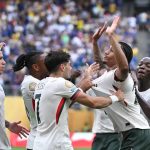 Chelsea players (Credit: Getty Images)