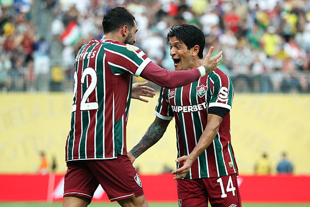 EAST RUTHERFORD, NEW JERSEY - JUNE 21: Juan Freytes #22 of Fluminense FC celebrates with German Cano #14 after scoring his team's third goal during the FIFA Club World Cup 2025 group F match between Fluminense FC and Ulsan HD FC at MetLife Stadium on June 21, 2025 in East Rutherford, New Jersey. (Photo by Elsa - FIFA/FIFA via Getty Images)