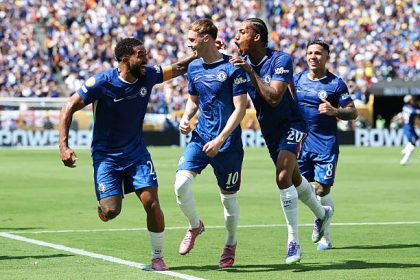 Cole Palmer celebrates scoring his team's second goal with Joao Pedro and Reece James (Photo Credit: Getty)