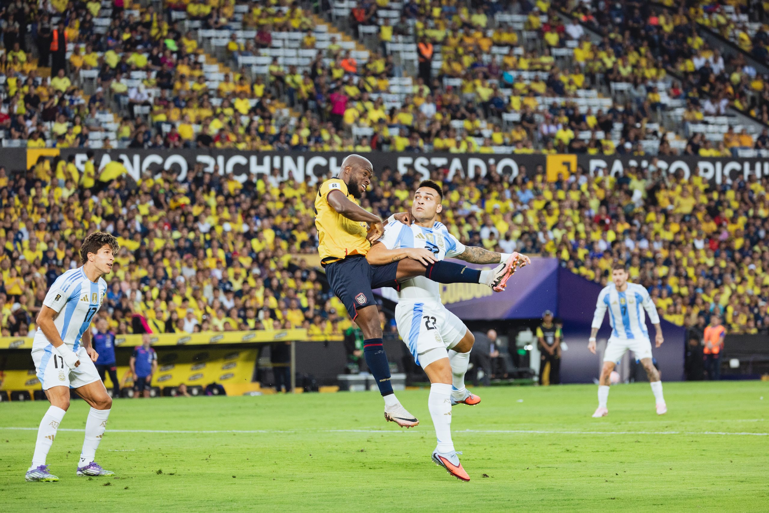 Lautaro Martinez battles for the ball against an Ecuador defender. Photo credit: Argentina media