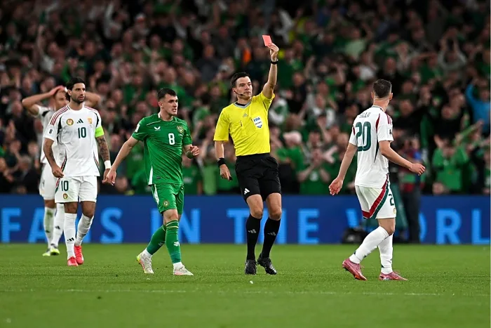 Referee Harm Osmers shows a red card to Roland Sallai of Hungary (Photo Credit: Hungary via X)