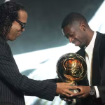 Ballon d'Or 2025 winner Ousmane Dembele receives the trophy from Ronaldinho (Credit: Ballon d’Or via X)