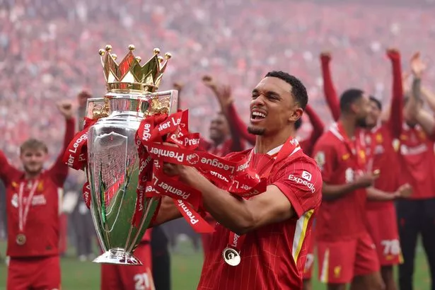 Trent Alexander Arnold lifting the Premier League title with Liverpool (Photo Credit: Liverpool website)