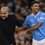 Manchester City coach Pep Guardiola and player Rodri (Photo Credit: Manchester City facebook page)