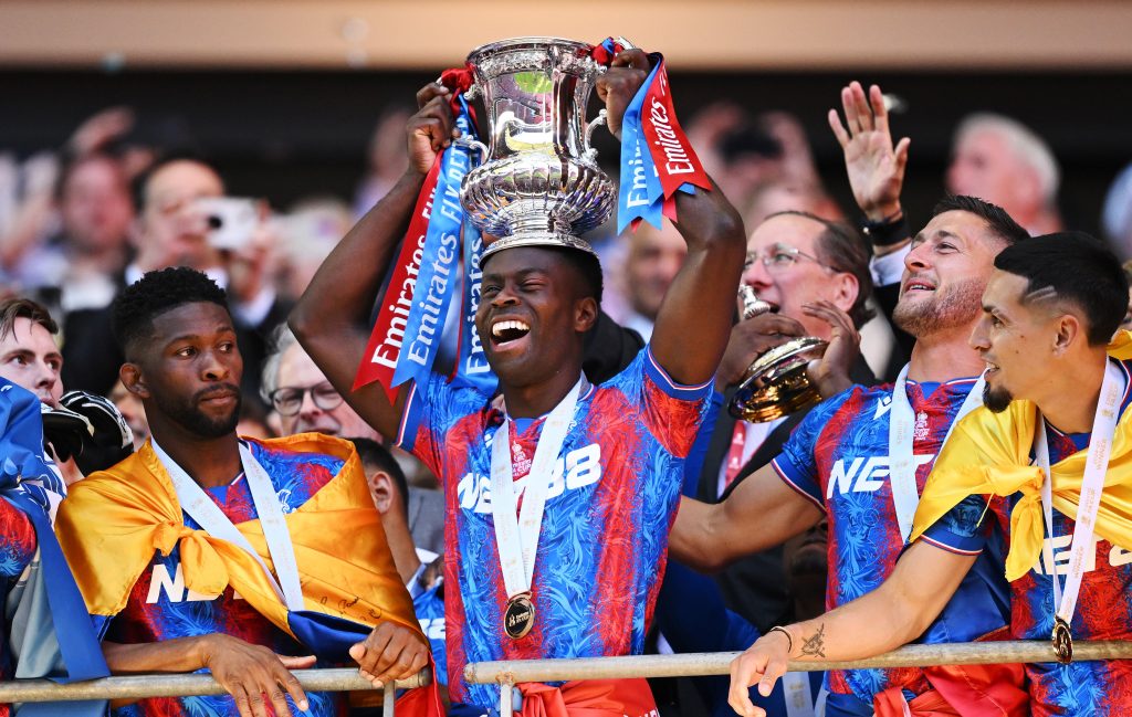 Marc Guehi lifting the 2025 FA cup with Crystal palace (Photo Credit: Crystal Palace X handle)