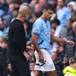 Manchester City coach Pep Guardiola and player Rodri (Photo Credit: Manchester City website)