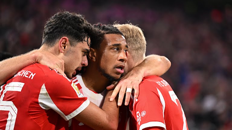 Bayern Munich's Michael Olise celebrates scoring their second goal with Konrad Laimer and Aleksandar Pavlovic - Photo Credit : REUTERS