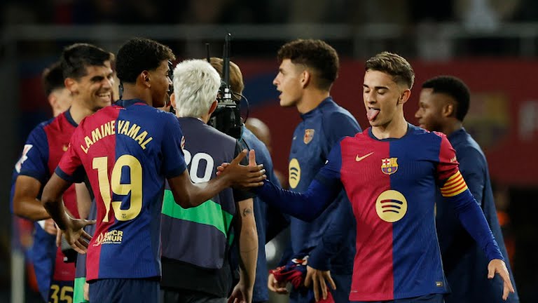 FC Barcelona's Gavi celebrates with Lamine Yamal after the match - Photo Credit : REUTERS