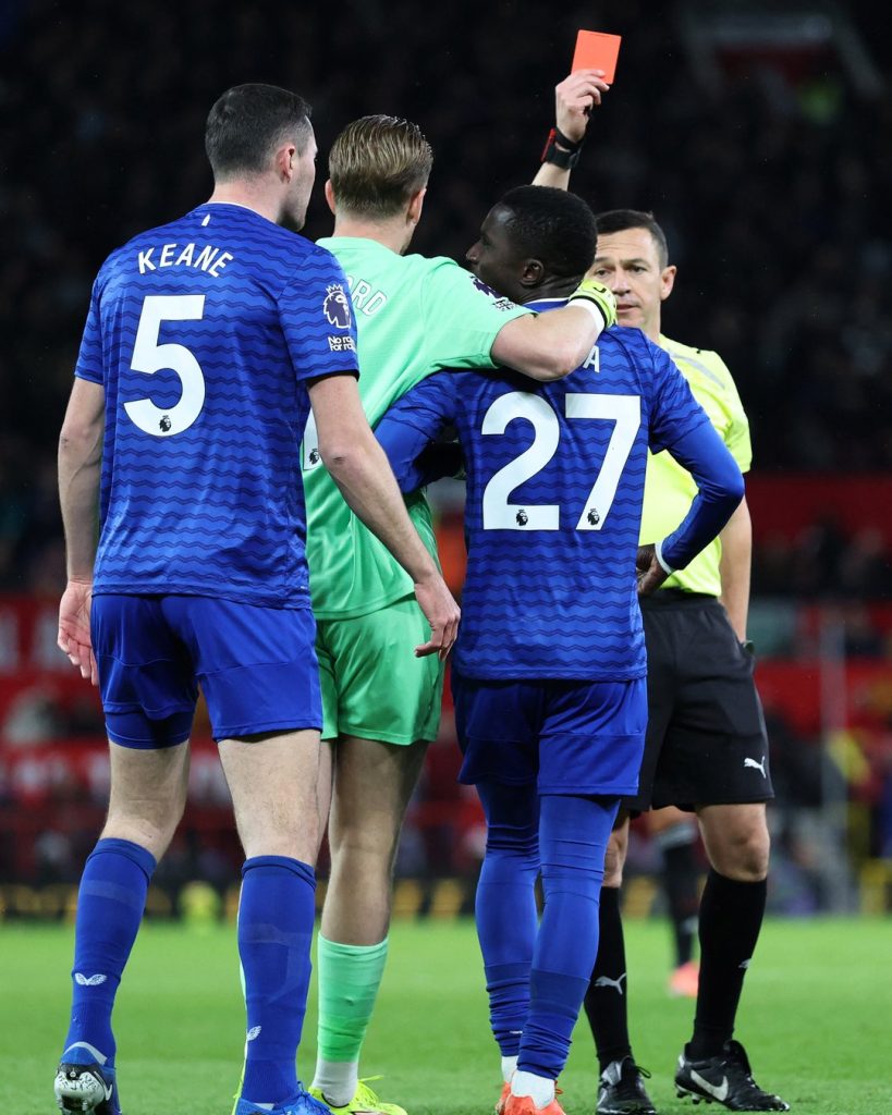 Idrissa Gueye sees red after clash with teammate Micheal Keane (Photo Credit: Premier League)