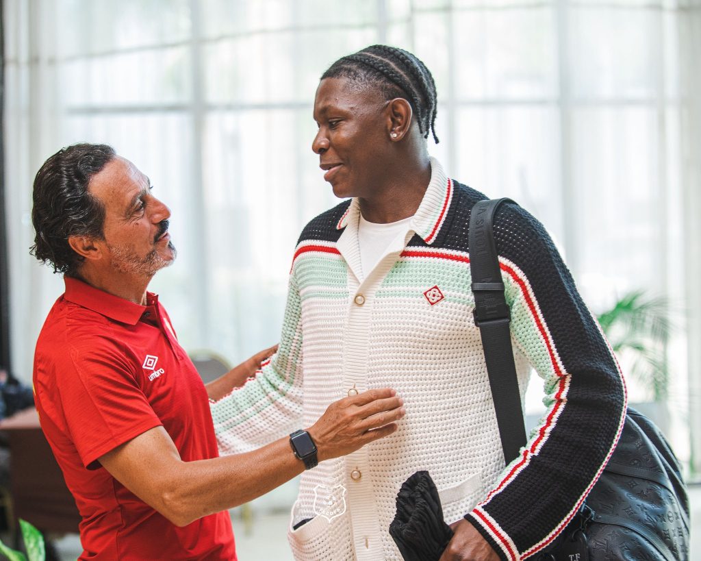 Timothy Fayulu of DR Congo with his Head Coach (Photo Credit: DRC via X)