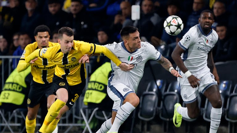 Inter Milan's Lautaro Martinez in action with BSC Young Boys' Sandro Lauper - Photo Credit : REUTERS