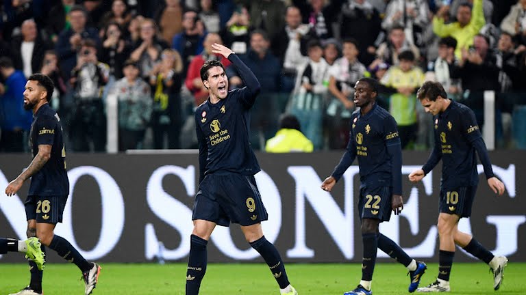 Juventus' Dusan Vlahovic and teammates celebrate after Lazio's Mario Gila scores Juventus first with an own goal - Photo Credit : REUTERS