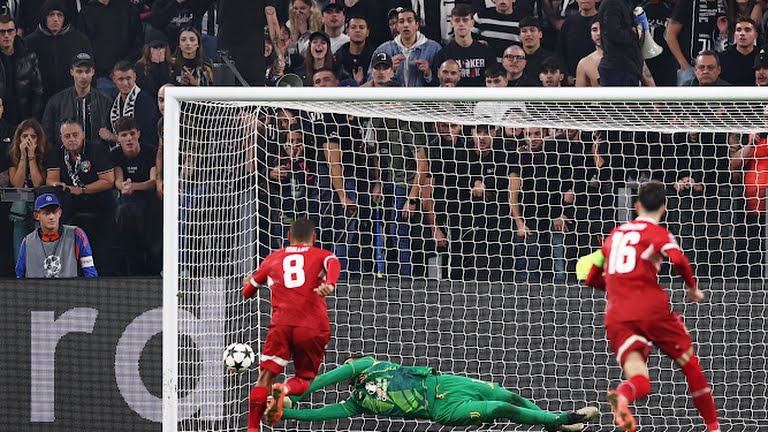 Juventus' Mattia Perin saves a penalty missed by VfB Stuttgart's Enzo Millot - Photo Credit : REUTERS