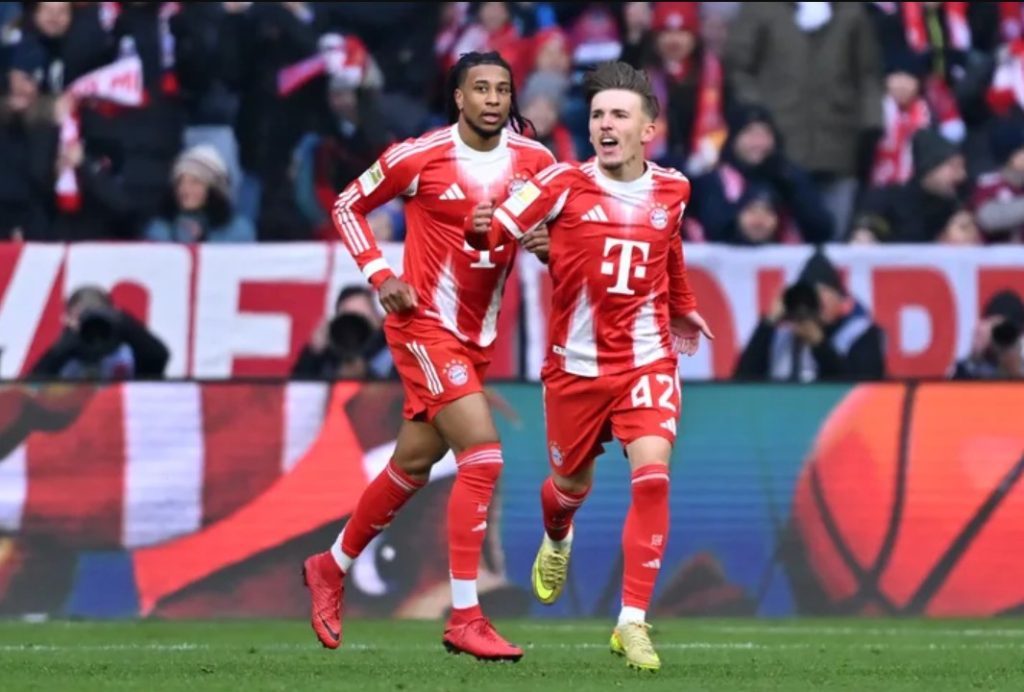 Micheal Olise and teammate celebrate. (Photo Credit: Bayern Munich Media).