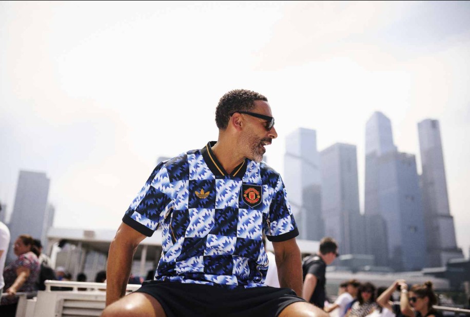 Rio Ferdinand looking fly in a Man United jersey. Photo Credit: Man United Media.