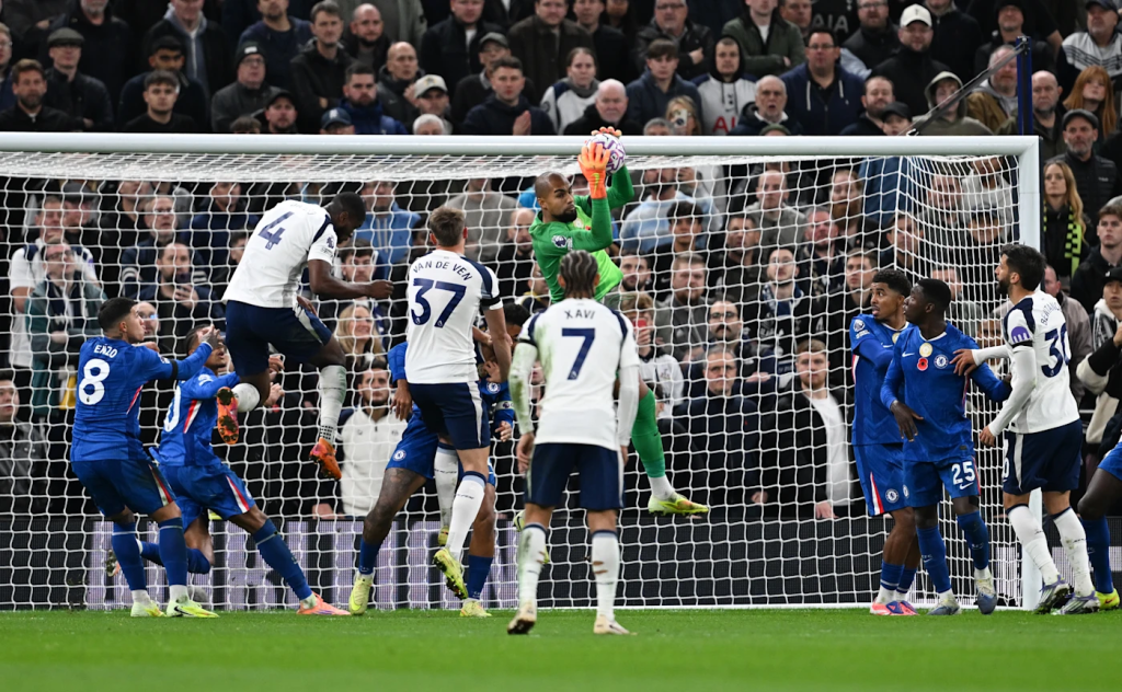 Chelsea Goalkeeper Robert Sanchez defends a setpiece during a premier league game against Tottenham (Photo Credit: Chelsea website)