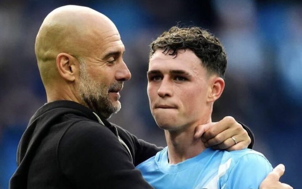 Pep Guardiola And Phil Foden (Photo Credit: Manchester City Media)