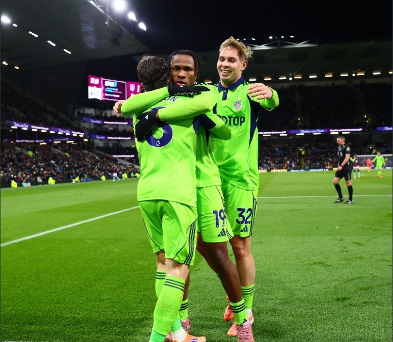 Harry Wilson hugs Samuel Chukwueze. (Photo Credit: Fulham Media).