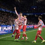 Antoine Griezmann celebrates with teammates, (Photo Credit: Atletico Media).