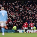 Bryan Mbeumo celebrates. (Photo Credit: Manchester United Media).