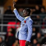 Michel Kuka Mboladinga posing as Lumumba (Photo Credit: DR Congo football Media)