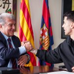 João Cancelo and Joan Laporta (Photo Credit: Barcelona via X)