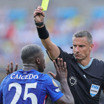 moisés caicedo receiving yellow card - Photo Credit : theguardian official Website