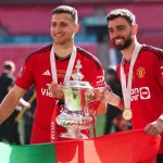 Diogo Dalot and Bruno Fernandes (Photo Credit: Manchester United website)