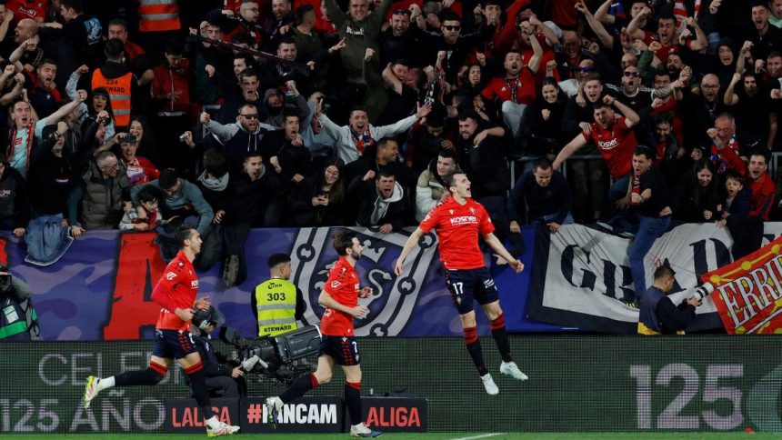 Osasuna players rejoice defeating Real Madrid 2-1 - Photo Credit : The Hindu
