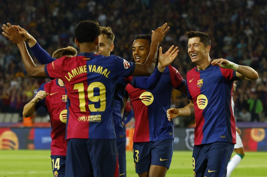 barcelona celebrating a goal. (photo credit: BBC sport media)