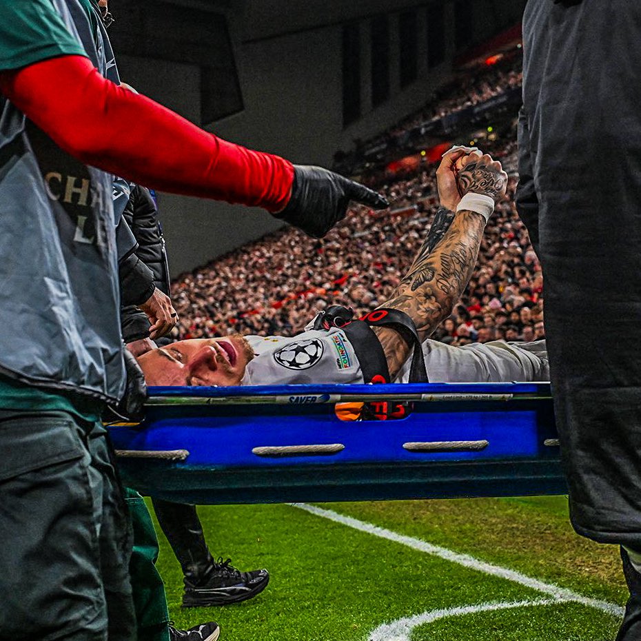 Nao Lang strectched out after colliding with advertising board- Photo credit: X