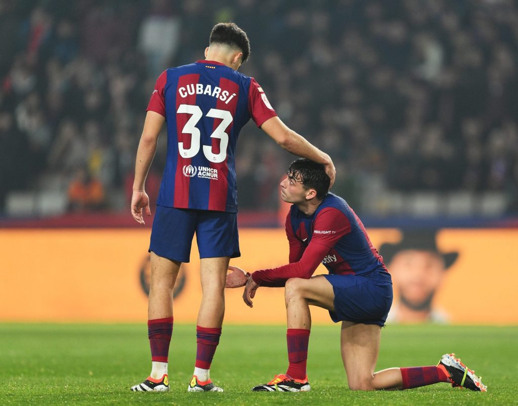 Pau Cubarsi and Pedri of FC Barcelona looks dejected at full-time following the teams defeat in the LaLiga EA Sports match between FC Barcelona and Villarreal CF - Photo Credit : Barca Universal