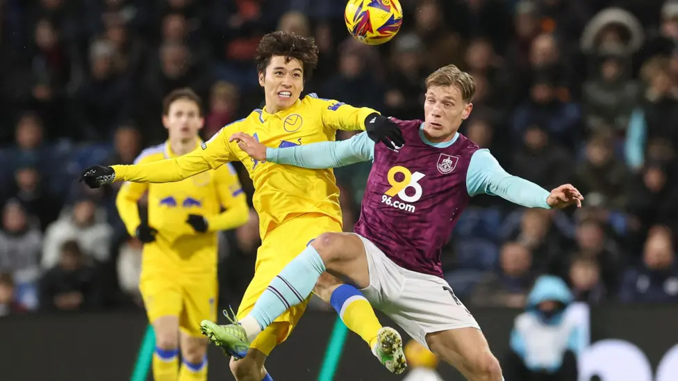 Leeds and burnley players fighting for possession (Photo credit: bbc media)