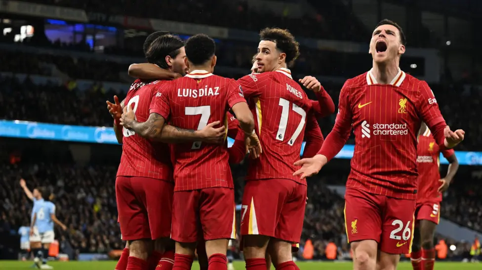 Liverpool players celebrating a goal - Photo credit: bbc media