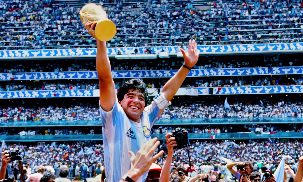Diego Maradona wining the FIFA World Cup in 1986 - Photo Credit :  The Guardian