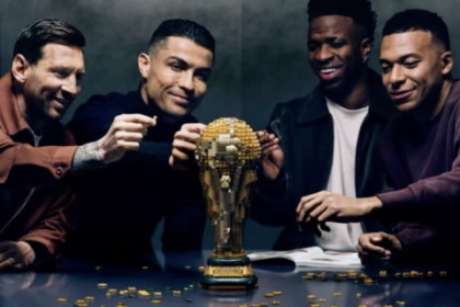 Lionel Messi, Ronaldo, Vini Jr, and Kylian Mbappe touching the World Cup - Photo Credit : Softfootball Media