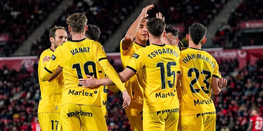 Girona players celebrating a goal (Photo credit: monesport media)