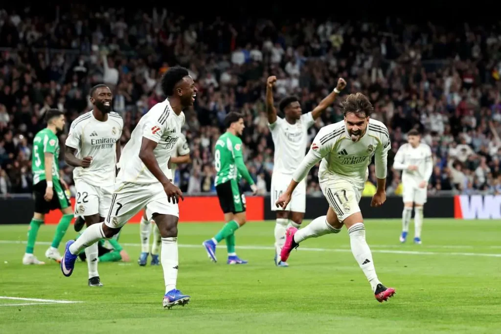 Real madrid players celebrating a goal (Photo credit: getfootballnewsspain media)
