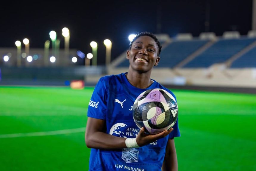 Asisat Oshoala with a ball while on Al Hilal Women team Jersey - Photo Credit : Julie Sports, Facebook