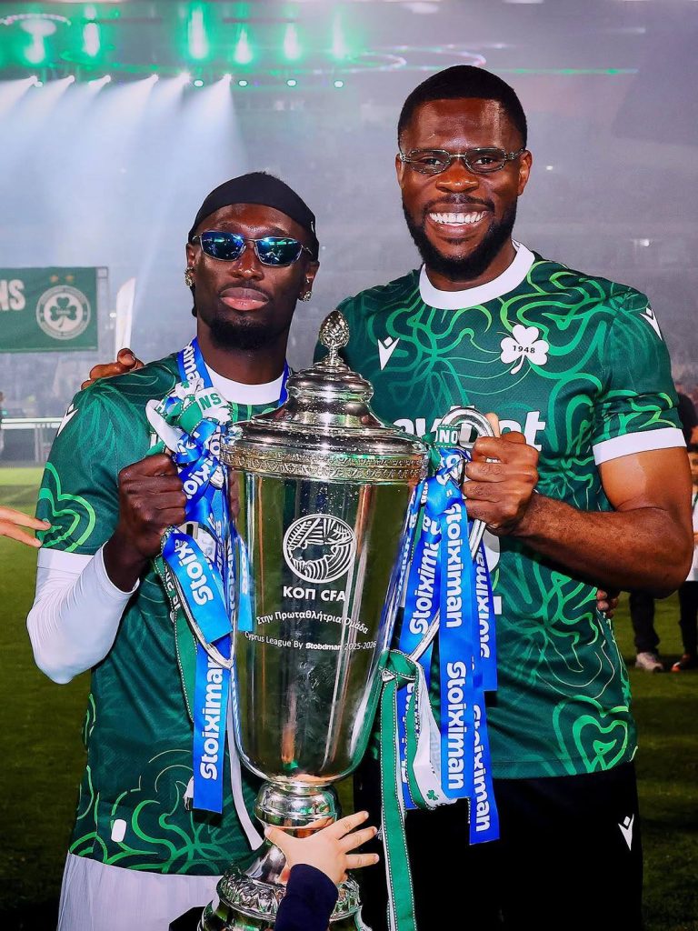 Francis Uzoho Celebrates with friend after winning the Cypriot League - Photo Credit : Julie Sports, Facebook