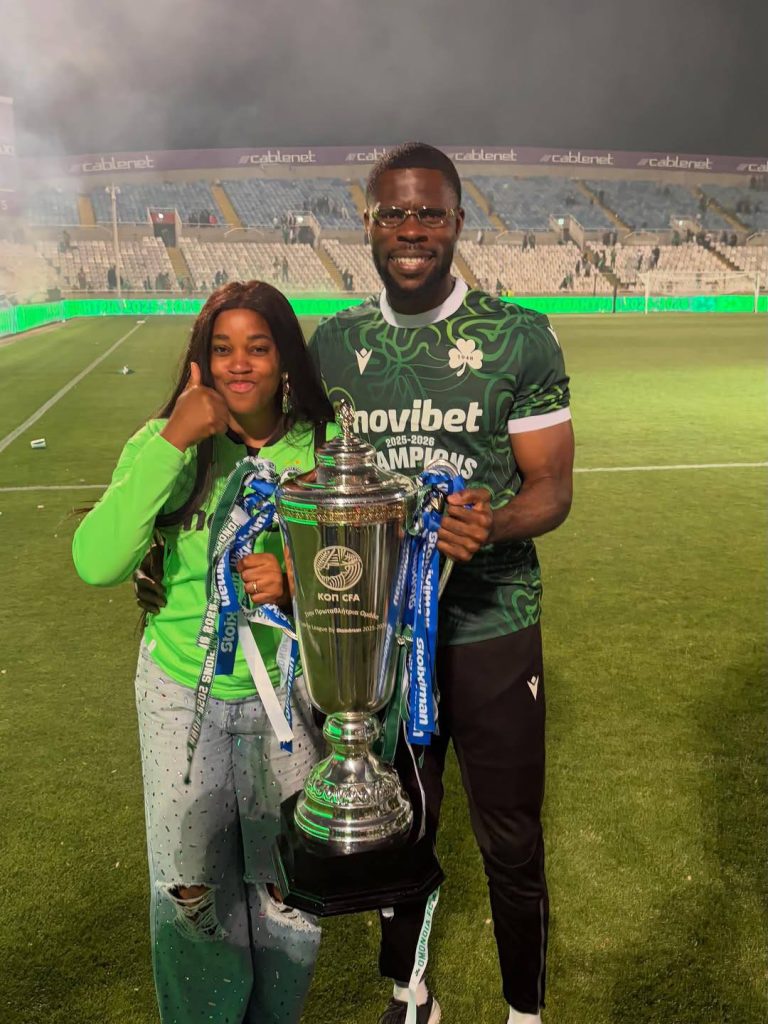 Francis Uzoho Celebrates with partner after winning the Cypriot League - Photo Credit : Julie Sports, Facebook