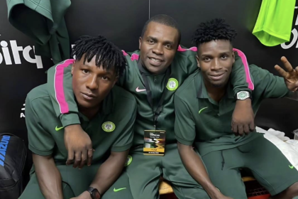 Super Eagles Duo Igboke and Oputa Celebrate Unity Cup Triumph With Enugu Rangers Manager - Photo Credit : Softfootball Media