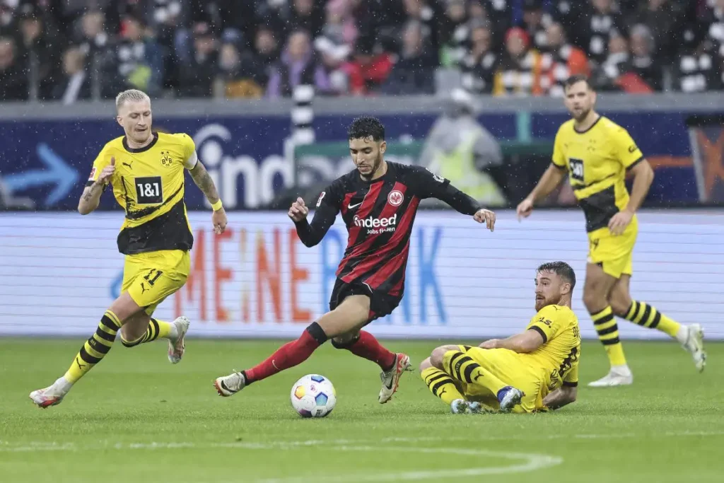 Omar Marmoush of Eintracht Frankfurt battles for possession with Salih Ozcan of Borussia Dortmund (Photo credit: getfootballnewsgermany media)