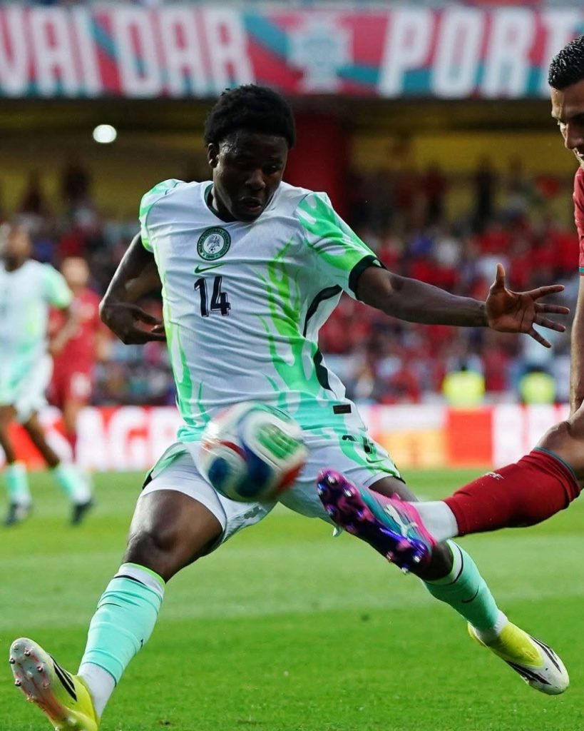 Christian Akpan making his debut for the Nigeria national football team against Portugal - Photo Credit : Softfootball Media