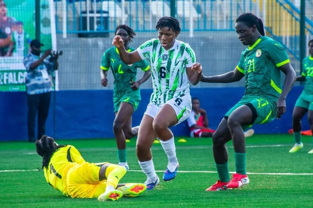 Joy Omewa puts the Super Falcons ahead with a well-taken header after being perfectly positioned inside the box - Photo Credit : Softfootball Media