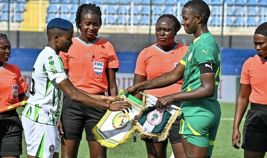 Super Falcons & Senegal women captains shaking hands ahead of their Friendly in Ikenne - Photo Credit : Softfootball Media
